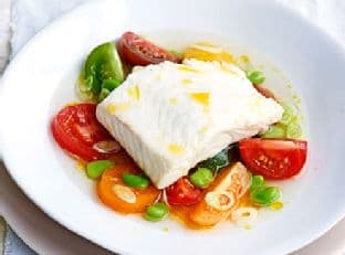 Poached halibut with heritage tomatoes