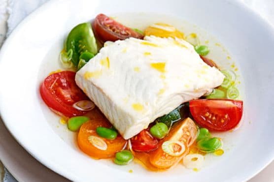 Poached halibut with heritage tomatoes