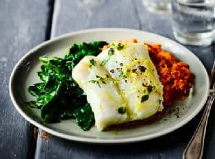 Herb & garlic baked cod with romesco sauce & spinach
