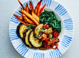 Roast aubergine with goulash sauce & sweet potato fries