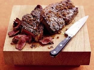 Sizzling steak with shallot marinade