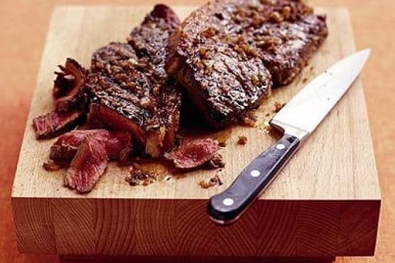 Sizzling steak with shallot marinade