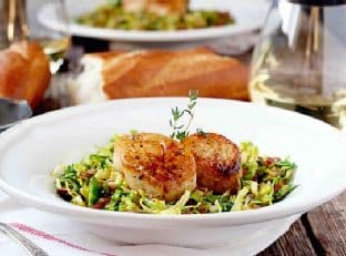 Seared Scallops on Shaved Brussels Sprouts and Crispy Pancetta