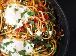 Harissa Zucchini Spaghetti Skillet with Kale, Chickpeas and Poached Eggs