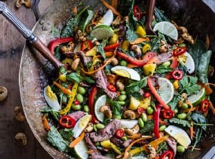 Thai Steak Salad with Sweet + Spicy Tahini Dressing and Sesame Chili-Lime Cashews