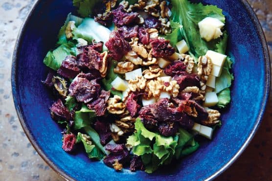 Escarole with Confit Duck Gizzards, Comté, and Walnuts
