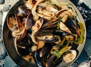 Stout-Steamed Shellfish with Charred Onions