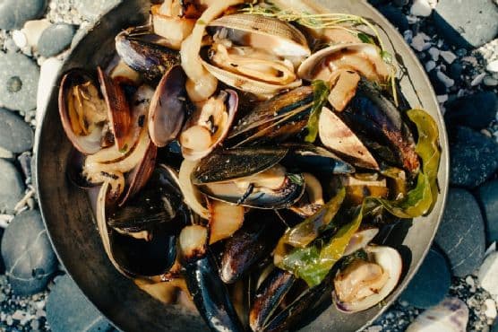 Stout-Steamed Shellfish with Charred Onions